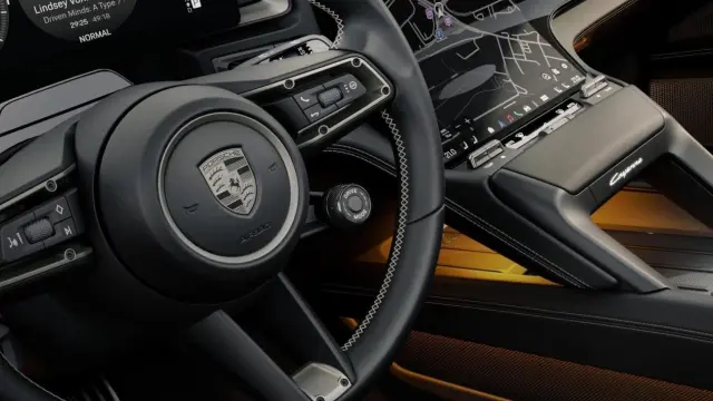 La función 'Push-to-Pass' se activa en el botón de modos de conducción del volante.