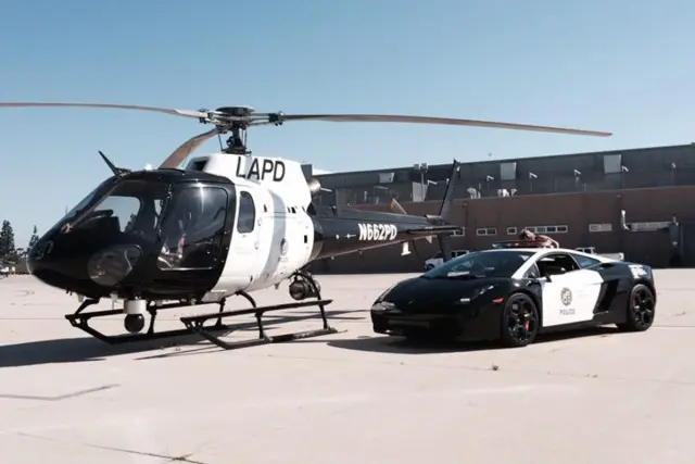 Lamborghini Gallardo y helicóptero