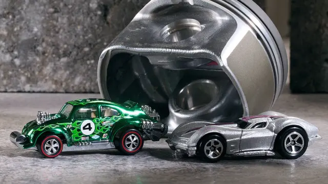 1963 Chevrolet Corvette Split Window y Volkswagen Escarabajo